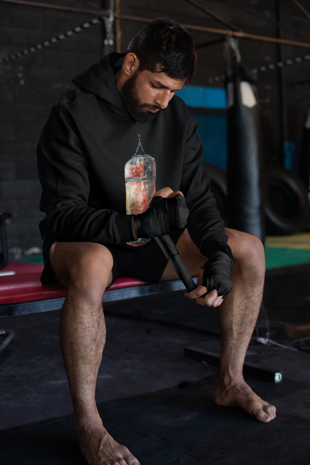 Red Orange Heavy Bag Worn – Black Hoodie
