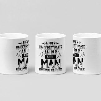 never underestimate an old man boxing mug in white