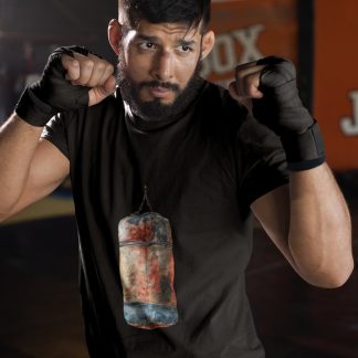 Red Orange Heavy Bag Worn boxing t-shirt in black, sparring shot