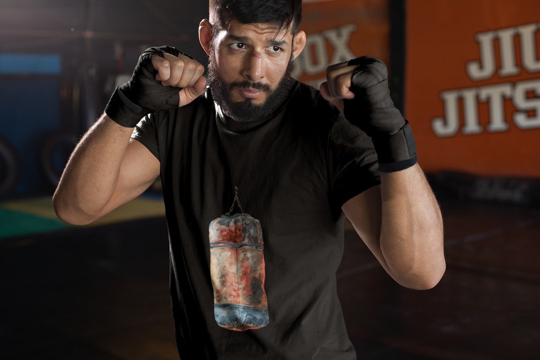 Red Orange Heavy Bag Worn boxing t-shirt in black, sparring shot