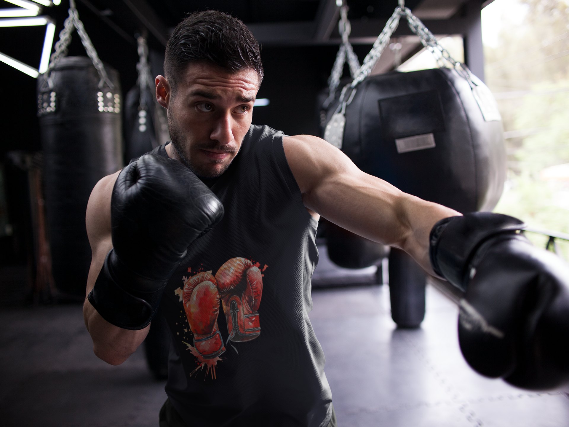 Red Gloves Fire Burst boxing vest in black, shadowboxing shot