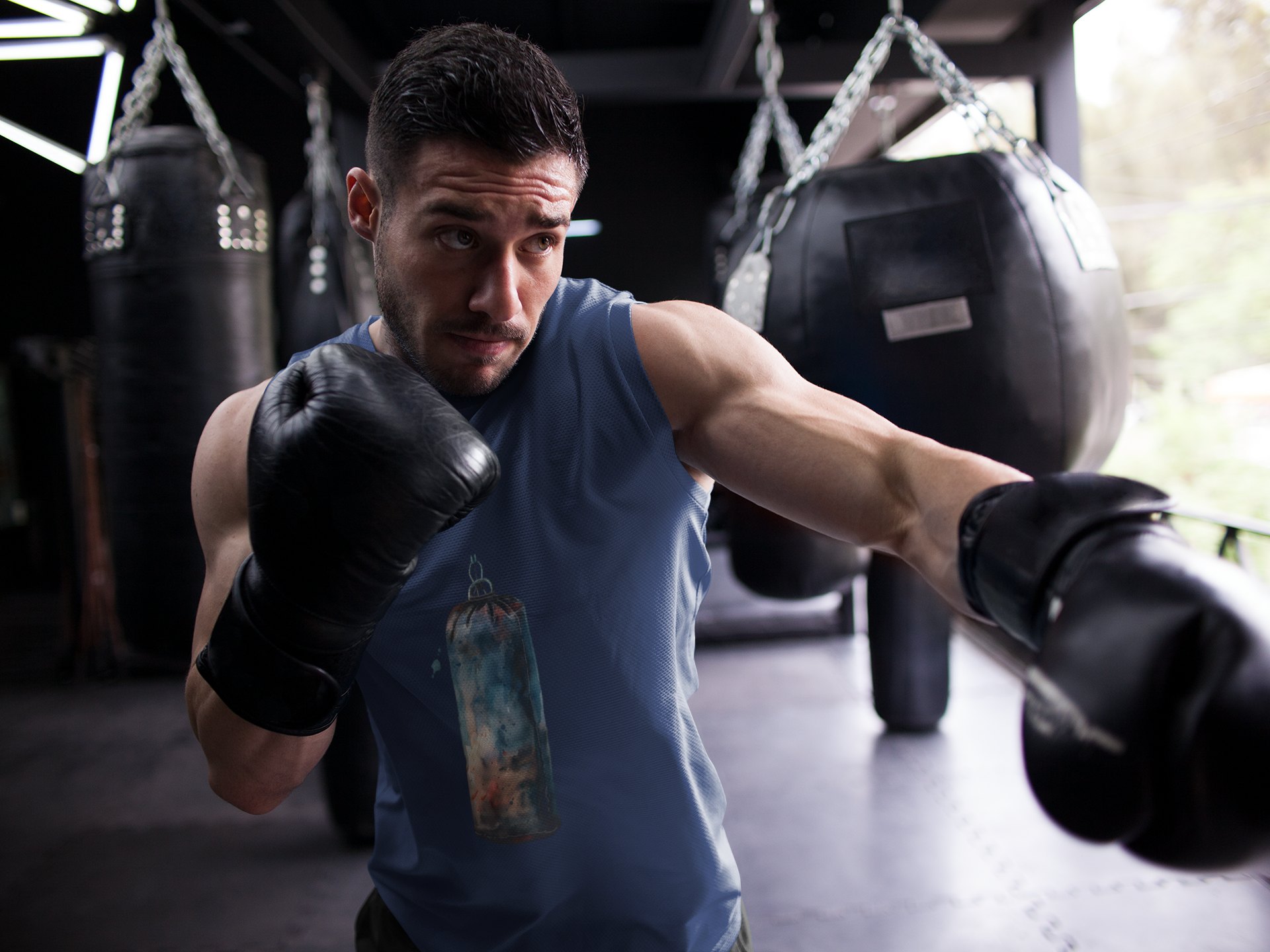 Red Heavy Bag Worn Hanging boxing vest in navy, shadowboxing shot