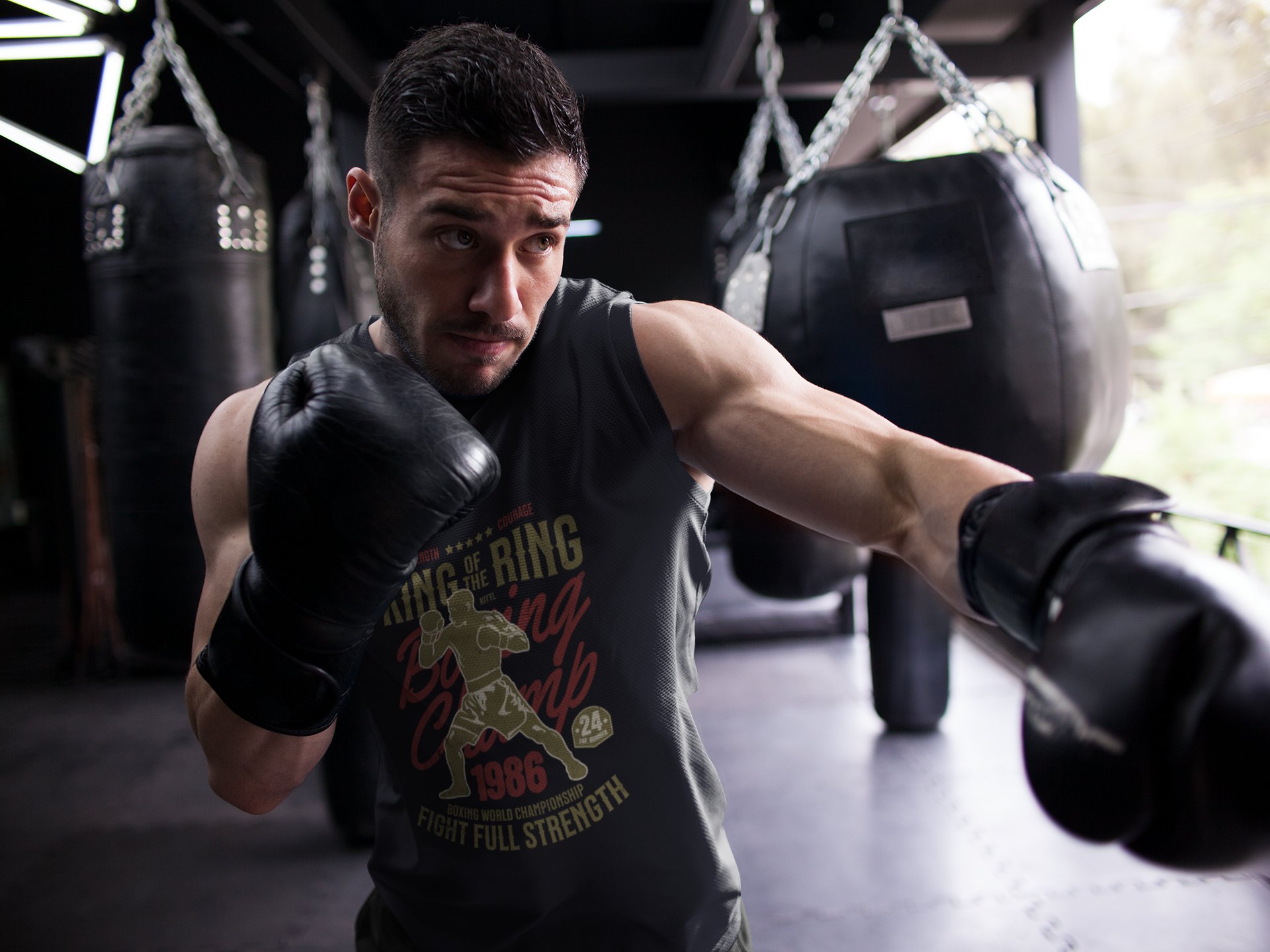 King Of The Ring Boxing Club boxing vest in black, shadowboxing shot