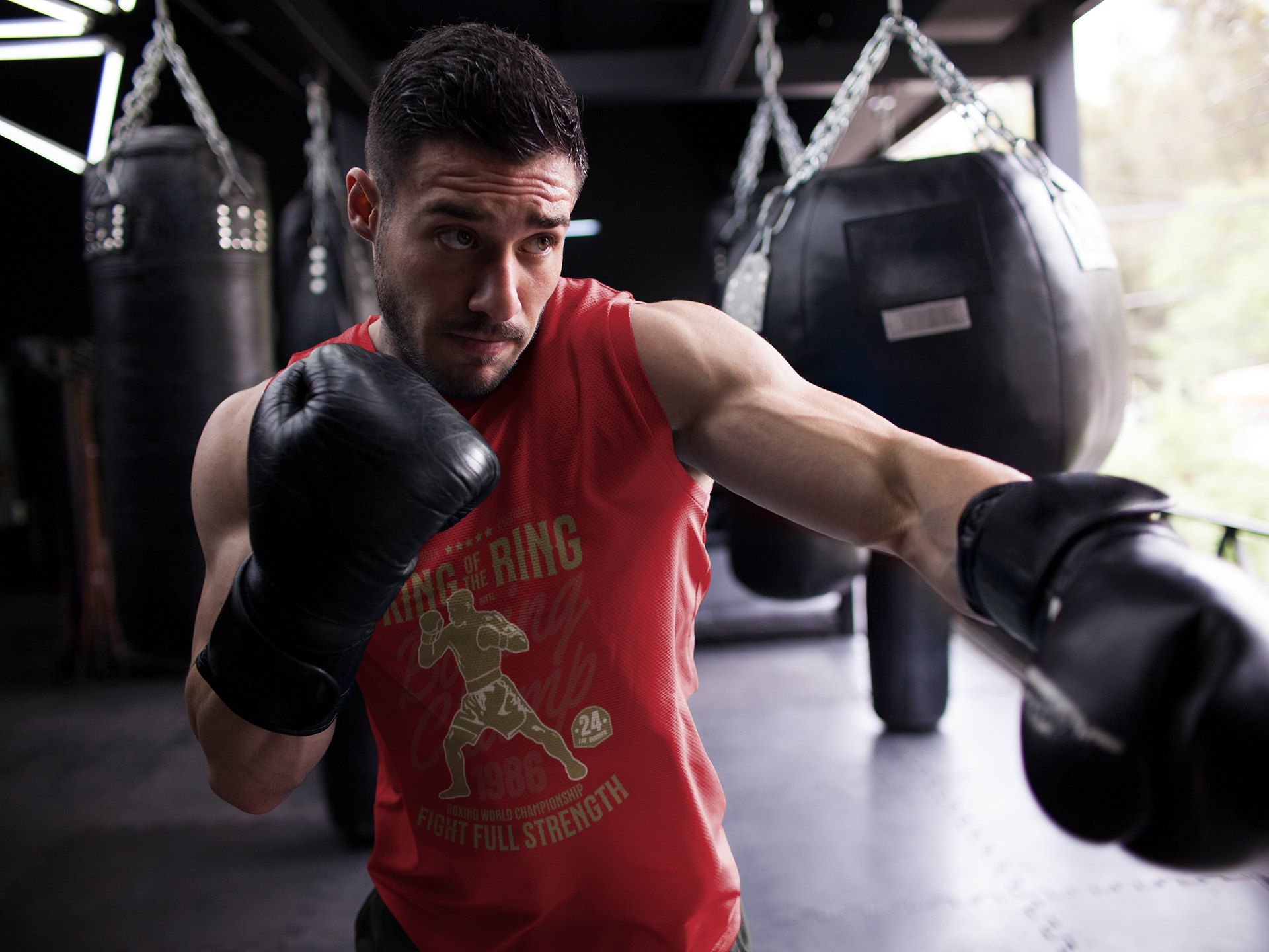 King Of The Ring Boxing Club boxing vest in red, shadowboxing shot