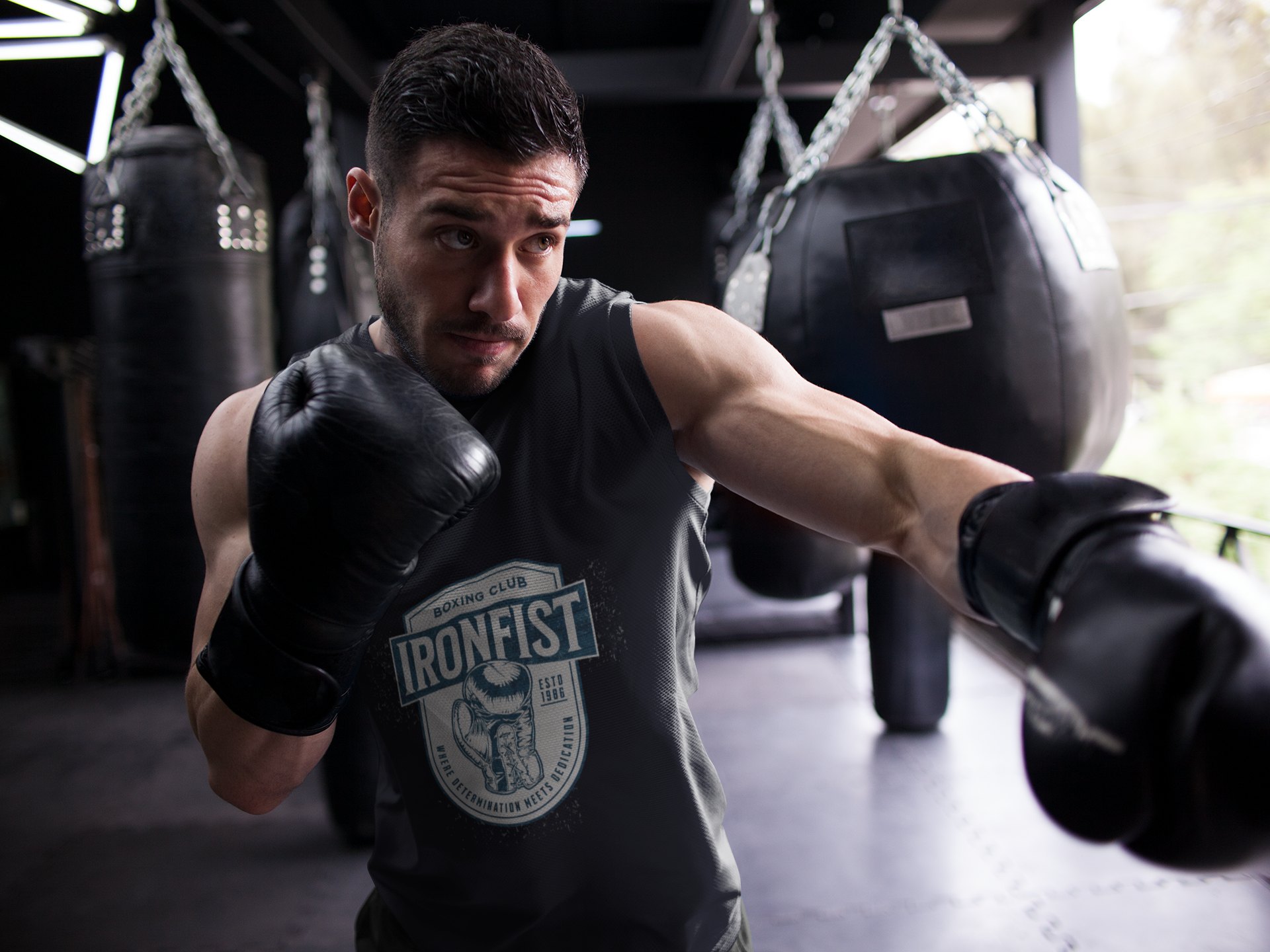 Iron Fist Boxing Club Emblem boxing vest in black, shadowboxing shot