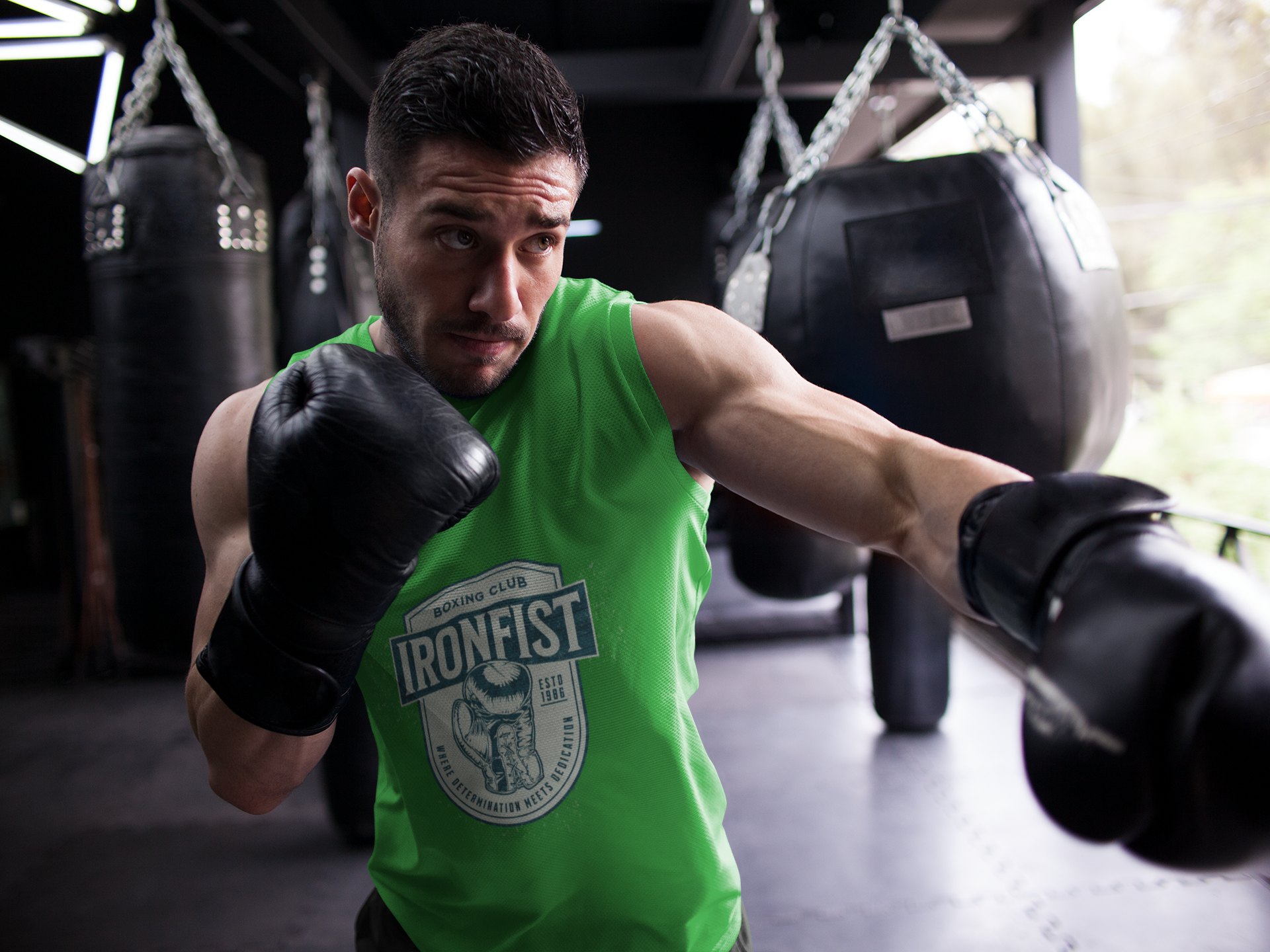 Iron Fist Boxing Club Emblem boxing vest in forest green, shadowboxing shot