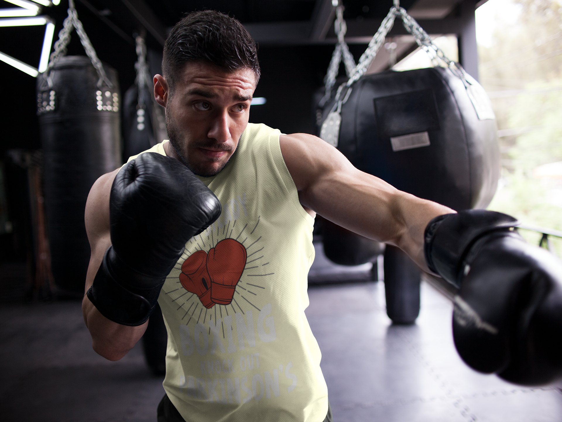 Rock Steady Boxing Parkinsons boxing vest in cream, shadowboxing shot