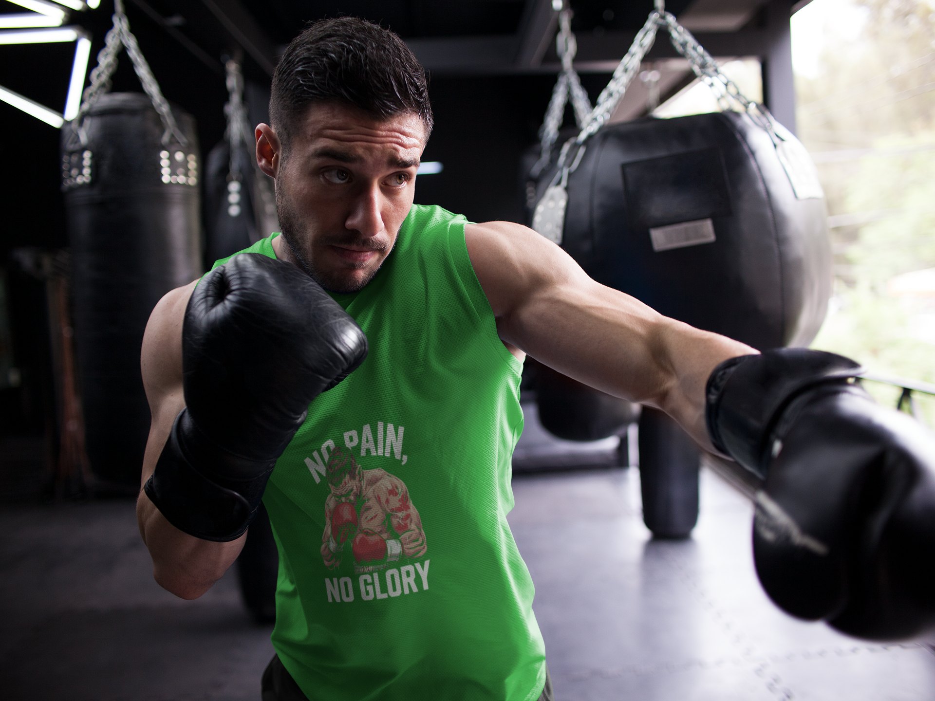No Pain Muscular Fighter boxing vest in forest green, shadowboxing shot