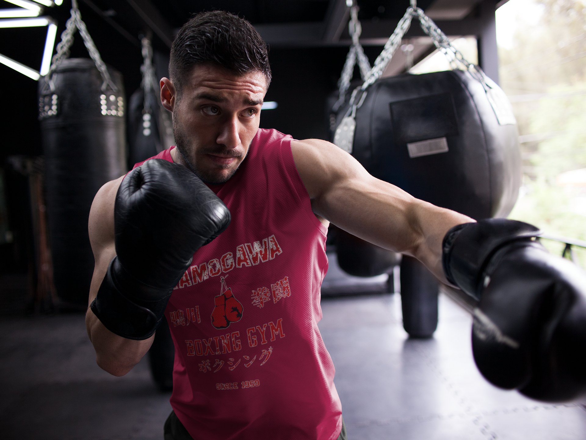 Kamogawa Boxing Gym boxing vest in burgundy, shadowboxing shot