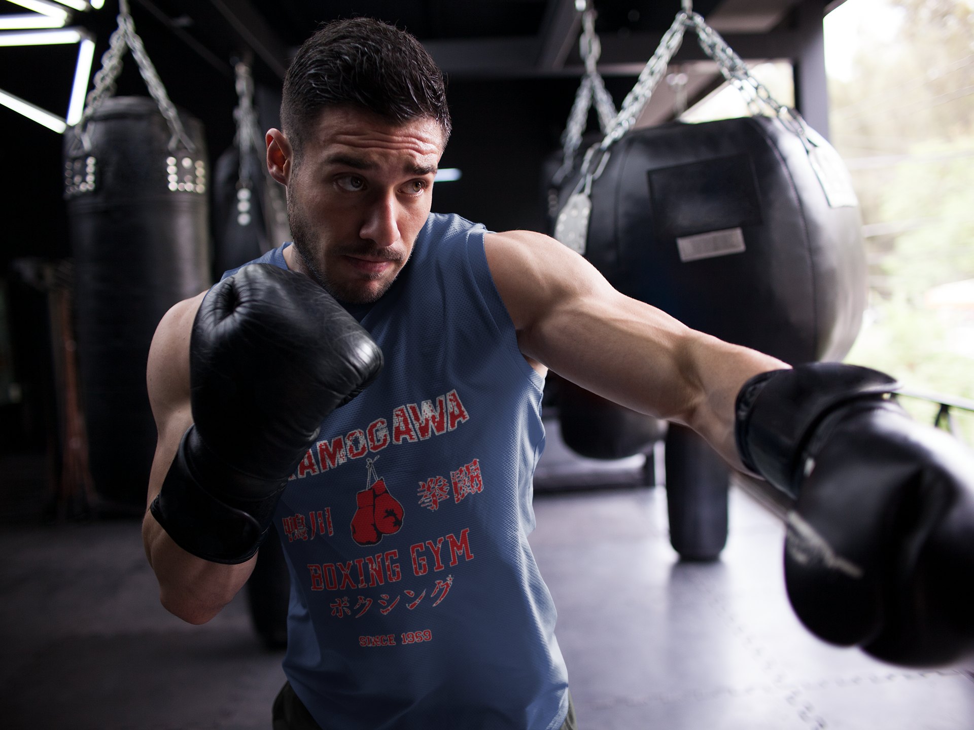 Kamogawa Boxing Gym boxing vest in navy, shadowboxing shot